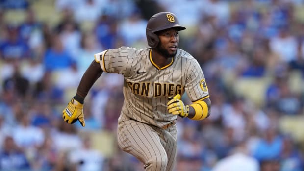 San Diego Padres OF Jurickson Profar runs to first base